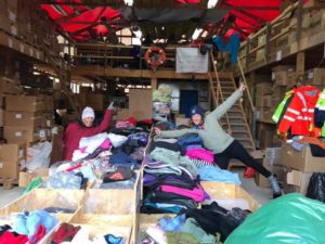 unpacking boxes for refugees