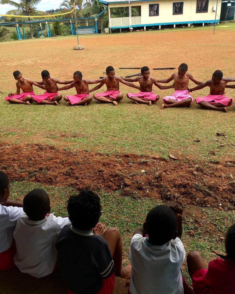 Fijian ceremony in public school with traditional sulu