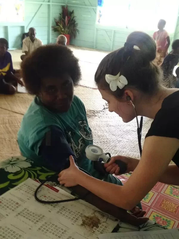 holly-underhill-naturopath-doing-health-checks-in-fiji