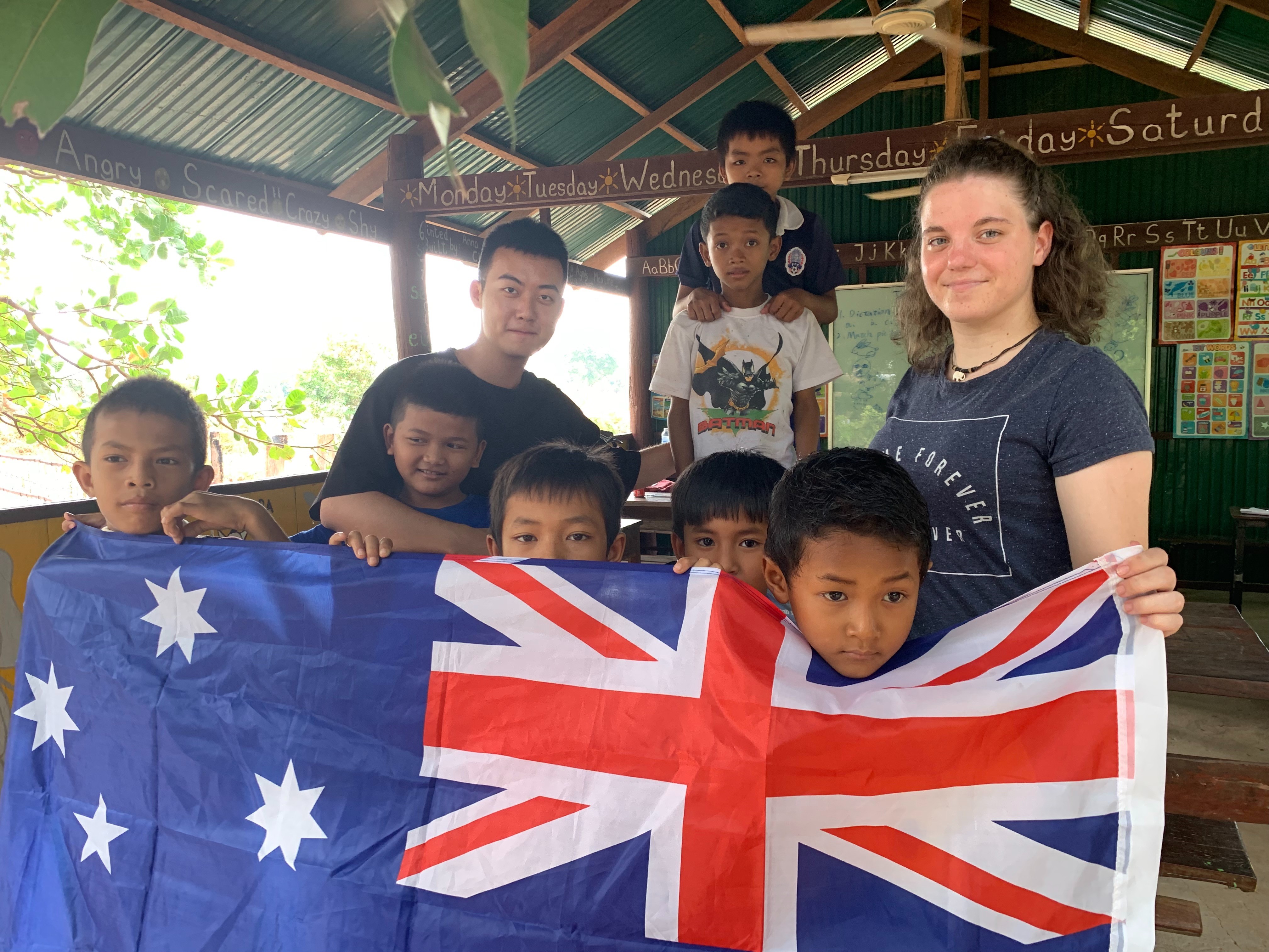 IVI volunteers with kids in Cambodia