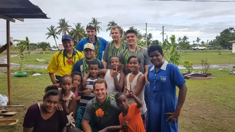 IVI volunteers with children in Fiji