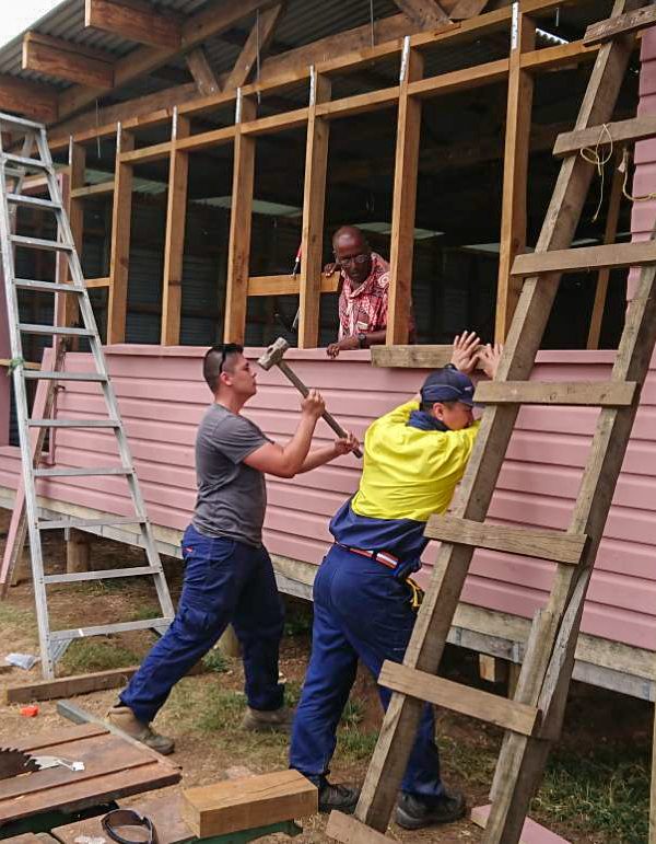 IVI voluntter working on fiji building project