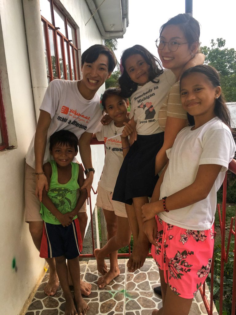 IVI volunteer with host family