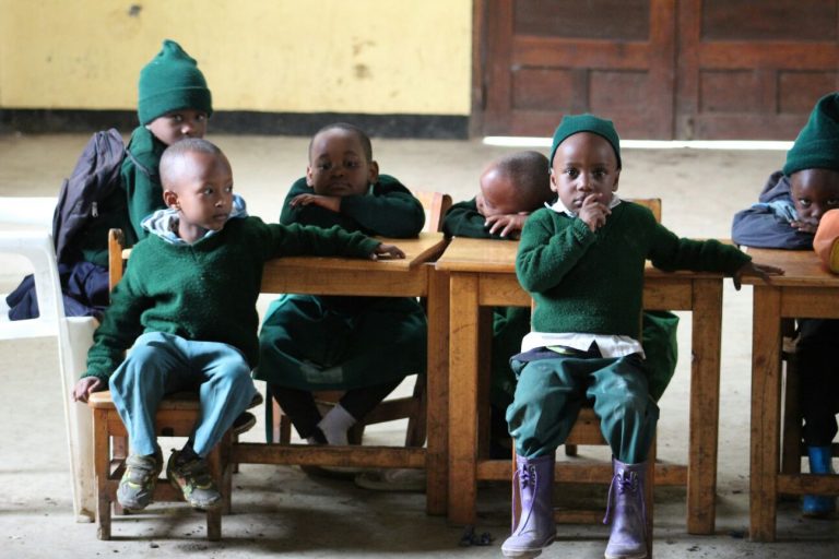 small children at school desk, Tanzania