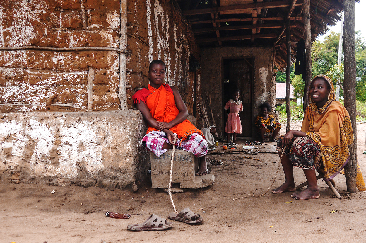 Villagers sitting at thier home