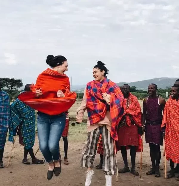 girls-jumping-with-group-of-Maasai-men