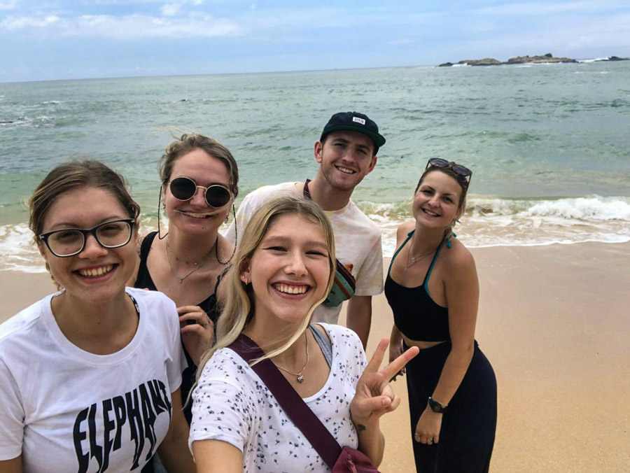 group of IVI volunteers on beach in Sri Lanka