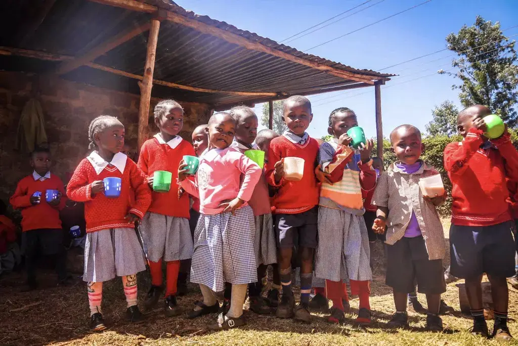 group of kindergaten kids with thier plastic drink cups-2