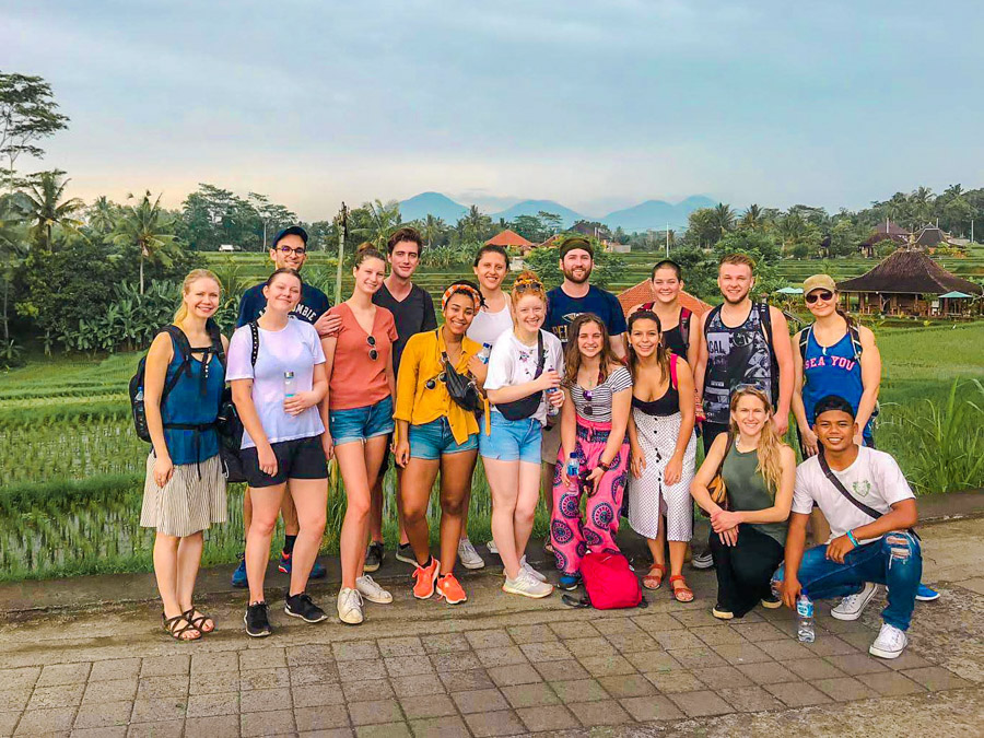 group of volunteers at rice fields