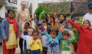 kindergarten-children-with-hands-in-air