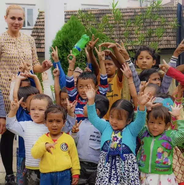 kindergarten-children-with-hands-in-air