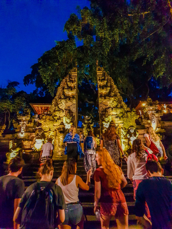 walking up steps to temple