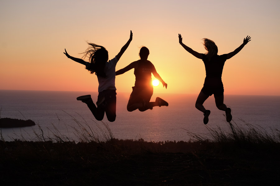 jumping silhouette sunset