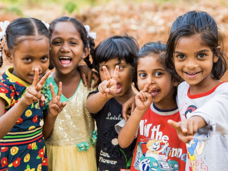 group of young kids smiling at camera