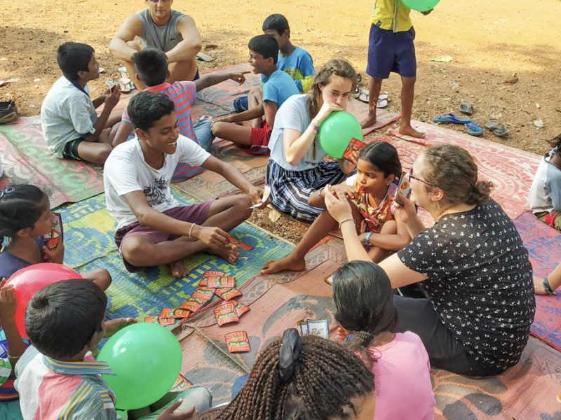 playing games on the mat outside