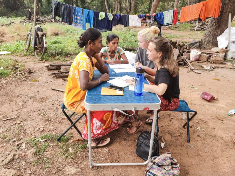 sitting with local women on outside table