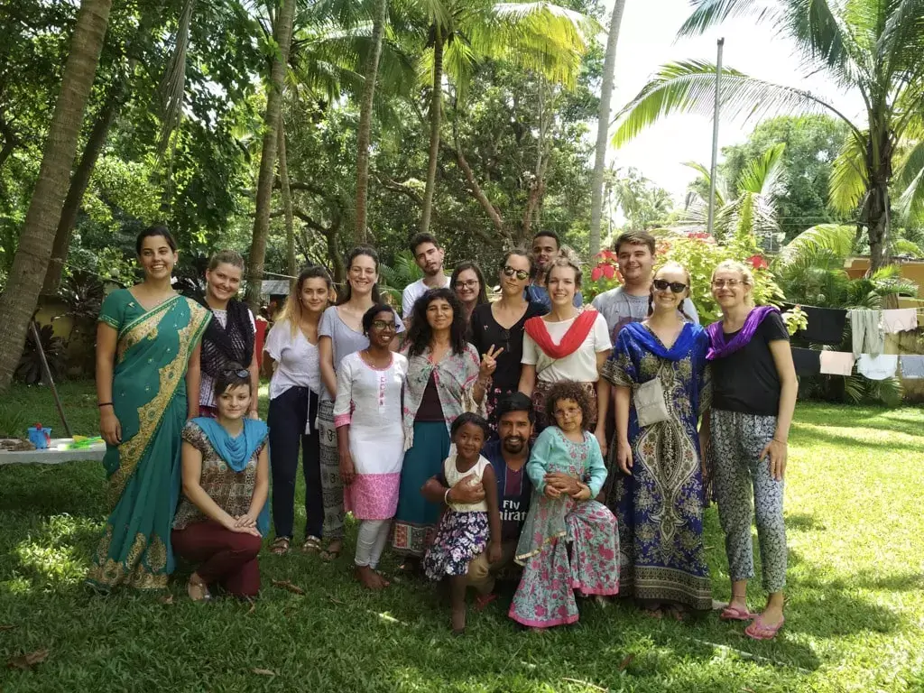 group posing in garden