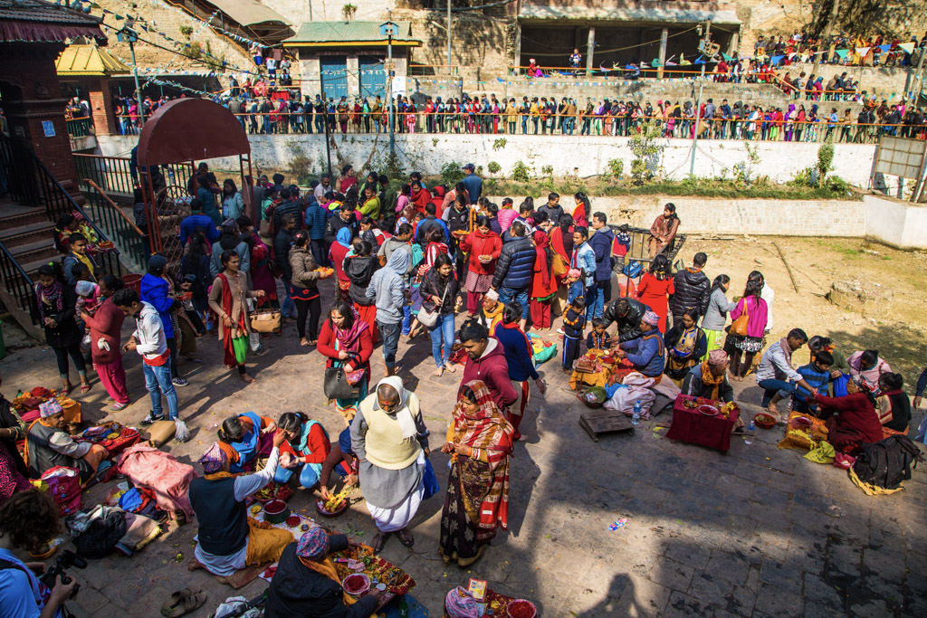 large group of locals at market