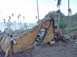 locals by destroyed home