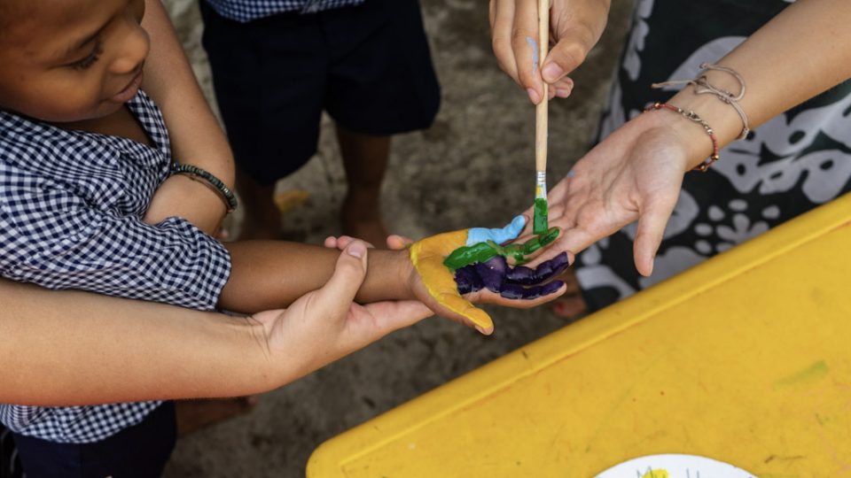 painting childs hand