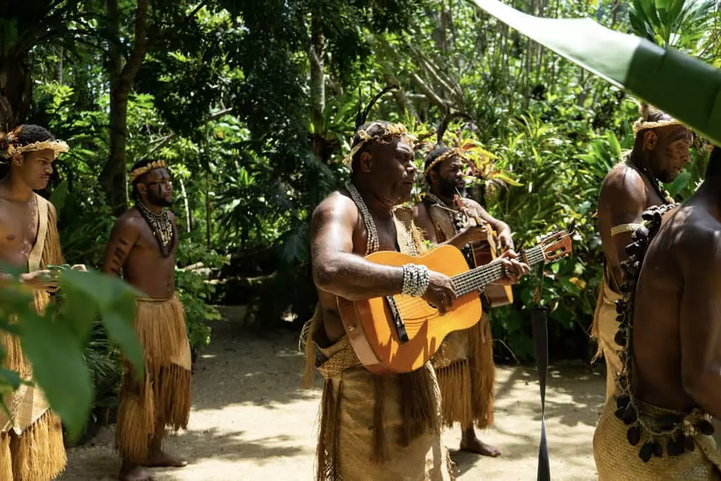 local men play guitar