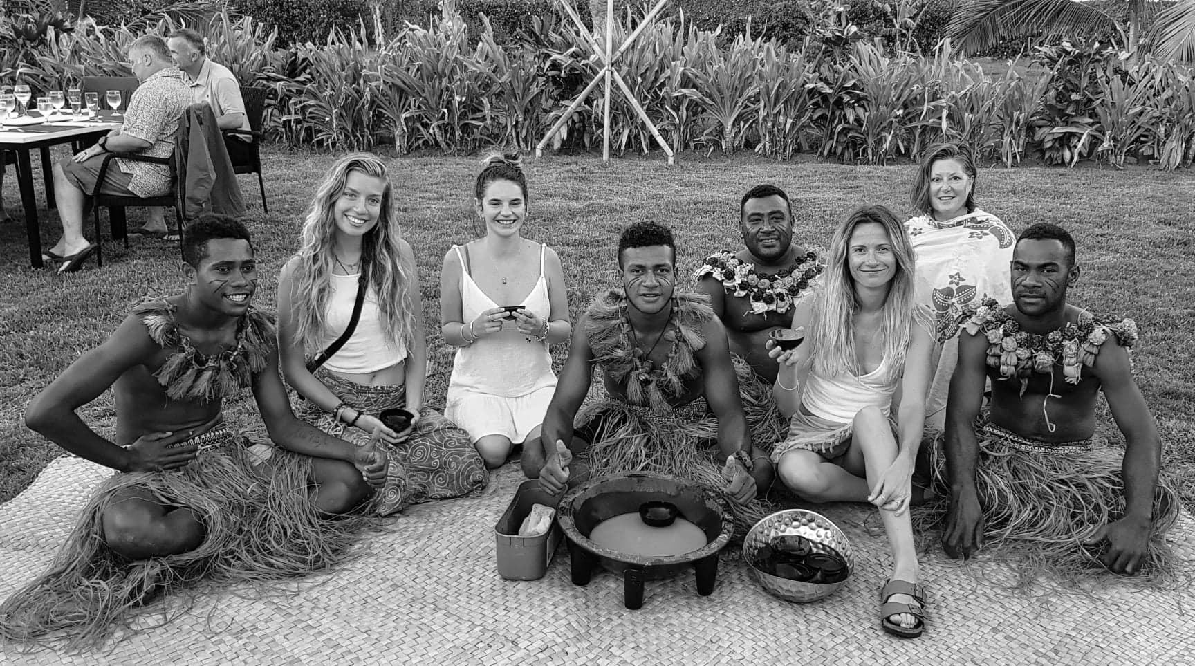 sitting with local Fijian men