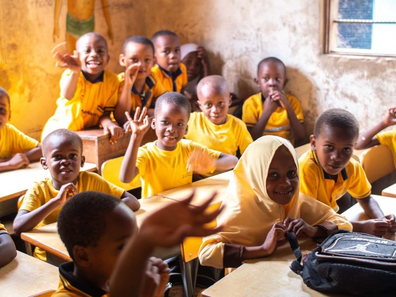 Students sit on their desk