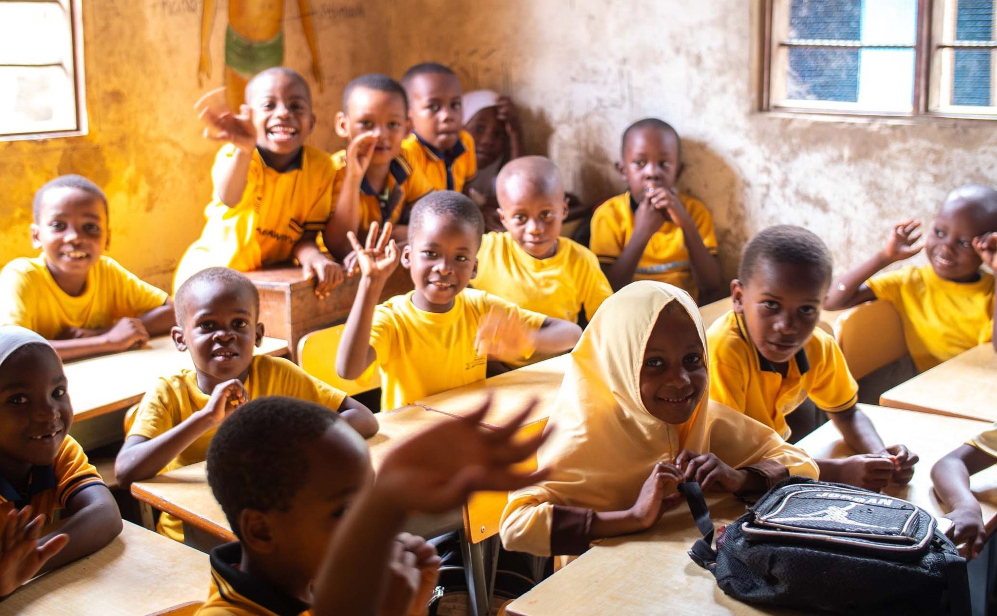 Students sit on their desk