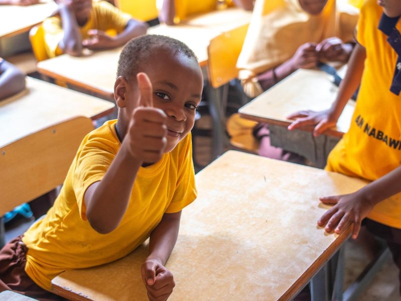 Students sit on their desk