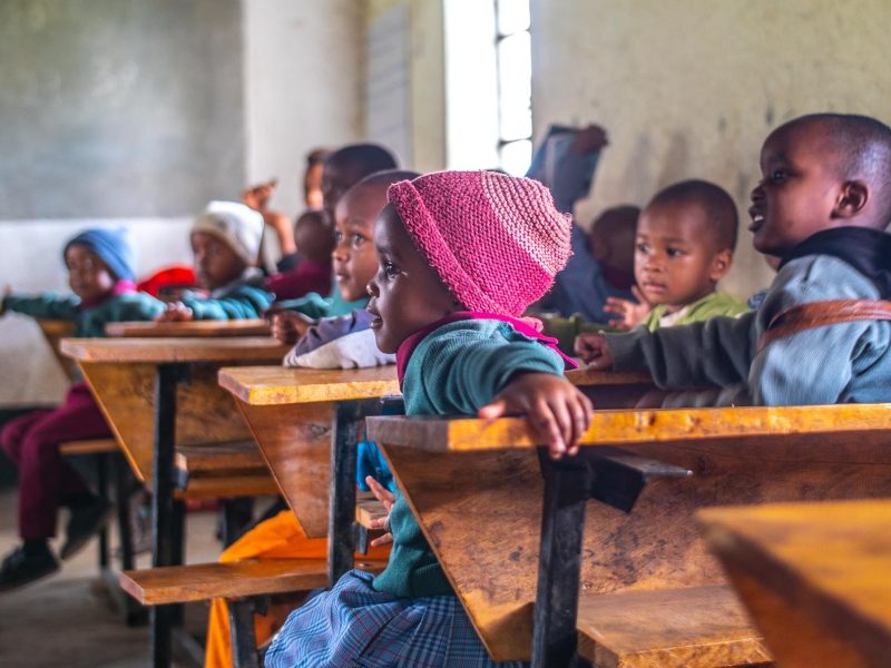 Students sit on their desk