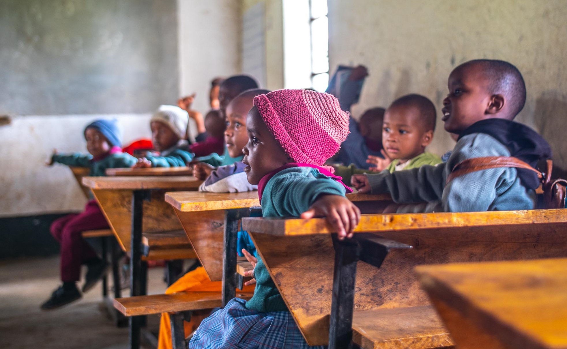 Students sit on their desk