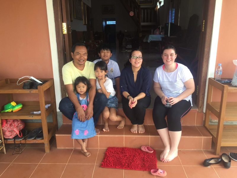 Group photo in front of entry