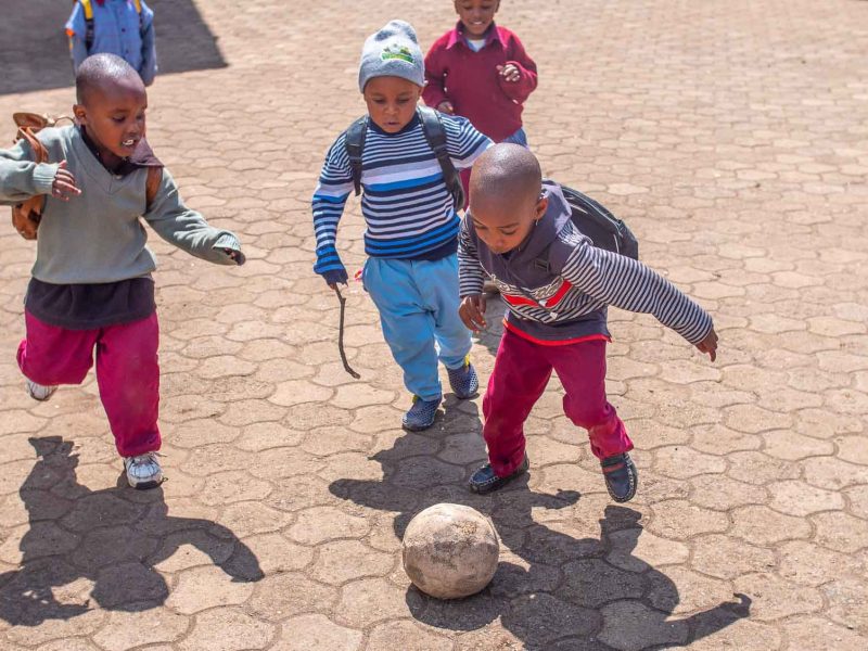 _Students playing football during break time