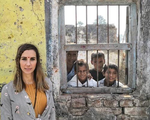 Amazing shot of el with kids behind bars in bodhgaya bodhi tree school volunteering