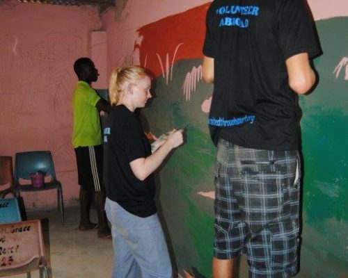 renovating a local school with painted wall