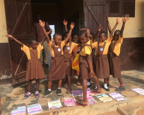 children proud of their art work