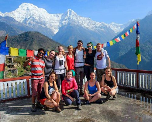 group with mountain backdrop