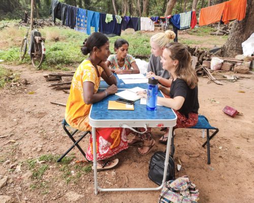 sitting with local women on outside table