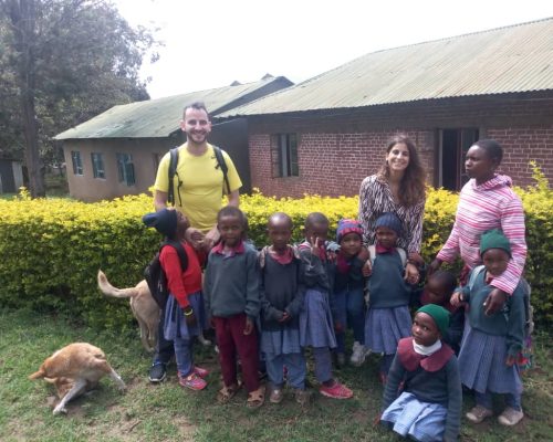 volunteers with Tanzanian students