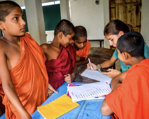 checking work in classroom