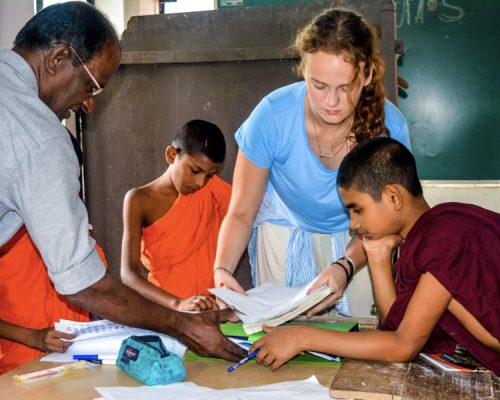 teaching monks in classroom