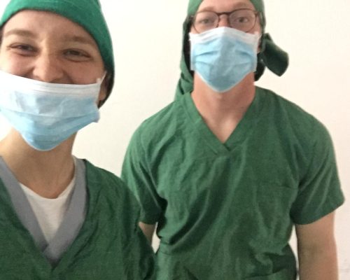 volunteer selfie in scrubs on Tanzania medical project