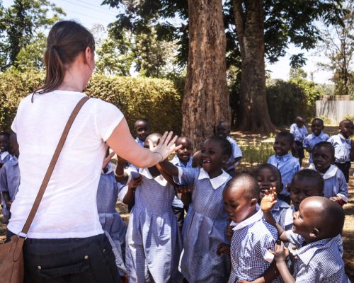 Participant playing with kids