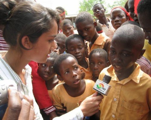 IVI volunteer interviewing a student