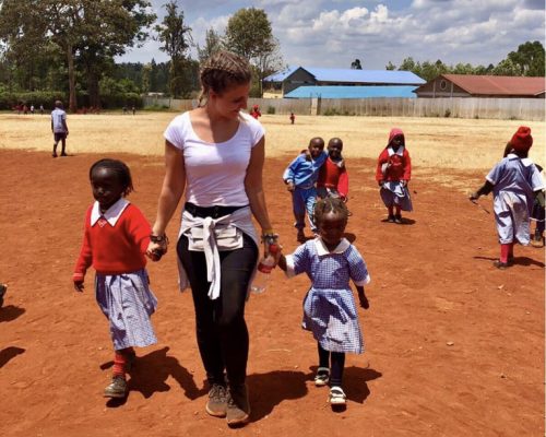 Participant playing with kids