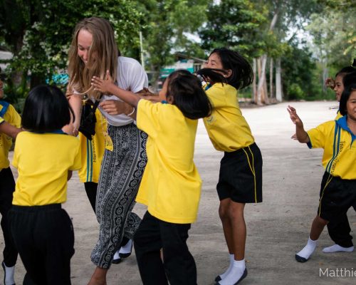 Participant playing with students during break time-3