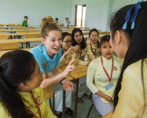 IVI Participant talking with students