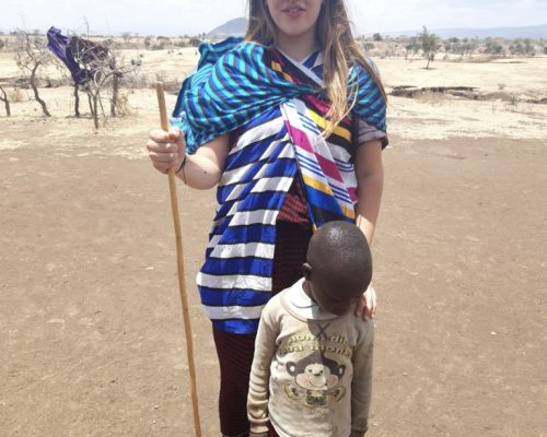 Participant with maasai kid