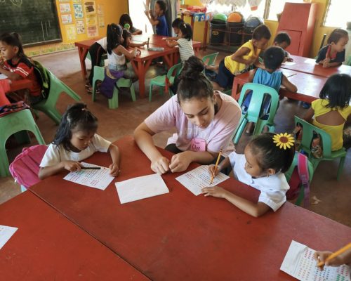 Participants helping the kids to do the exercise (13)