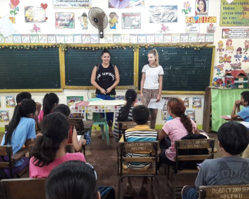 Participants in front of the class